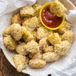 homemade baked chicken nuggets in a bowl with ketchup as dipping sauce