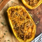spaghetti squash mexican boats on a wooden board