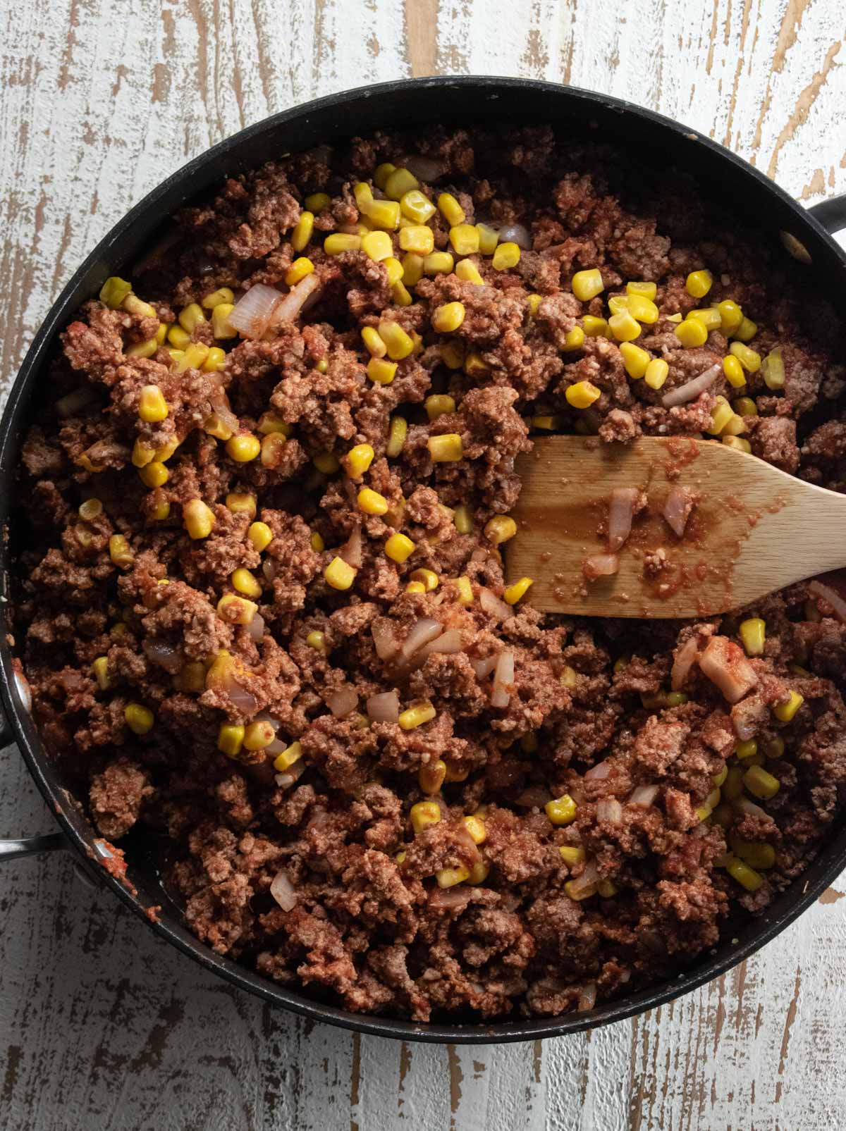 crushed tomatoes and corn added to the ground turkey skillet mix