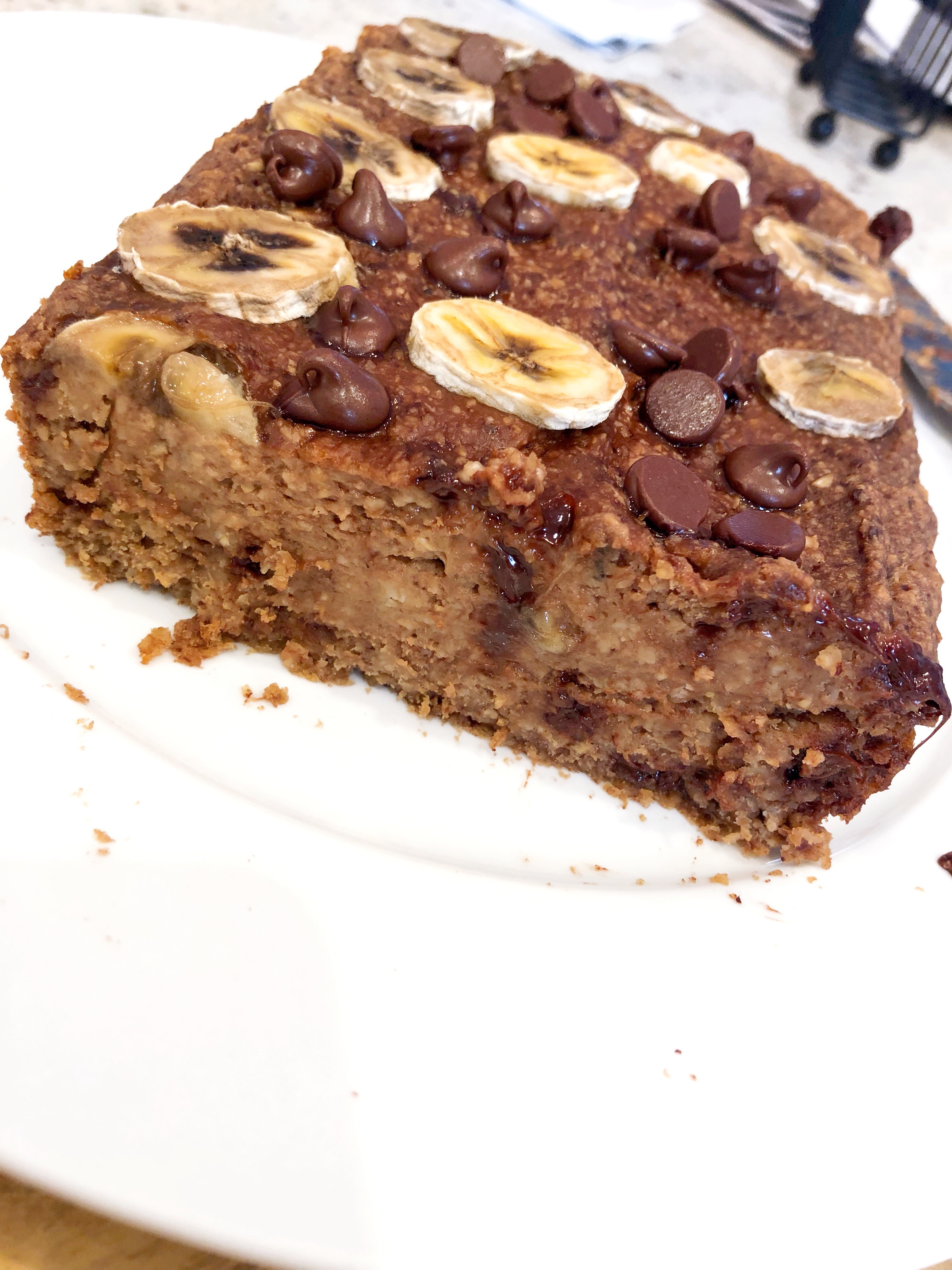 flourless banana bread with chocolate chips and banana slices on top