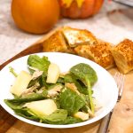 Chicken salad with apples and cheese crisps on side.