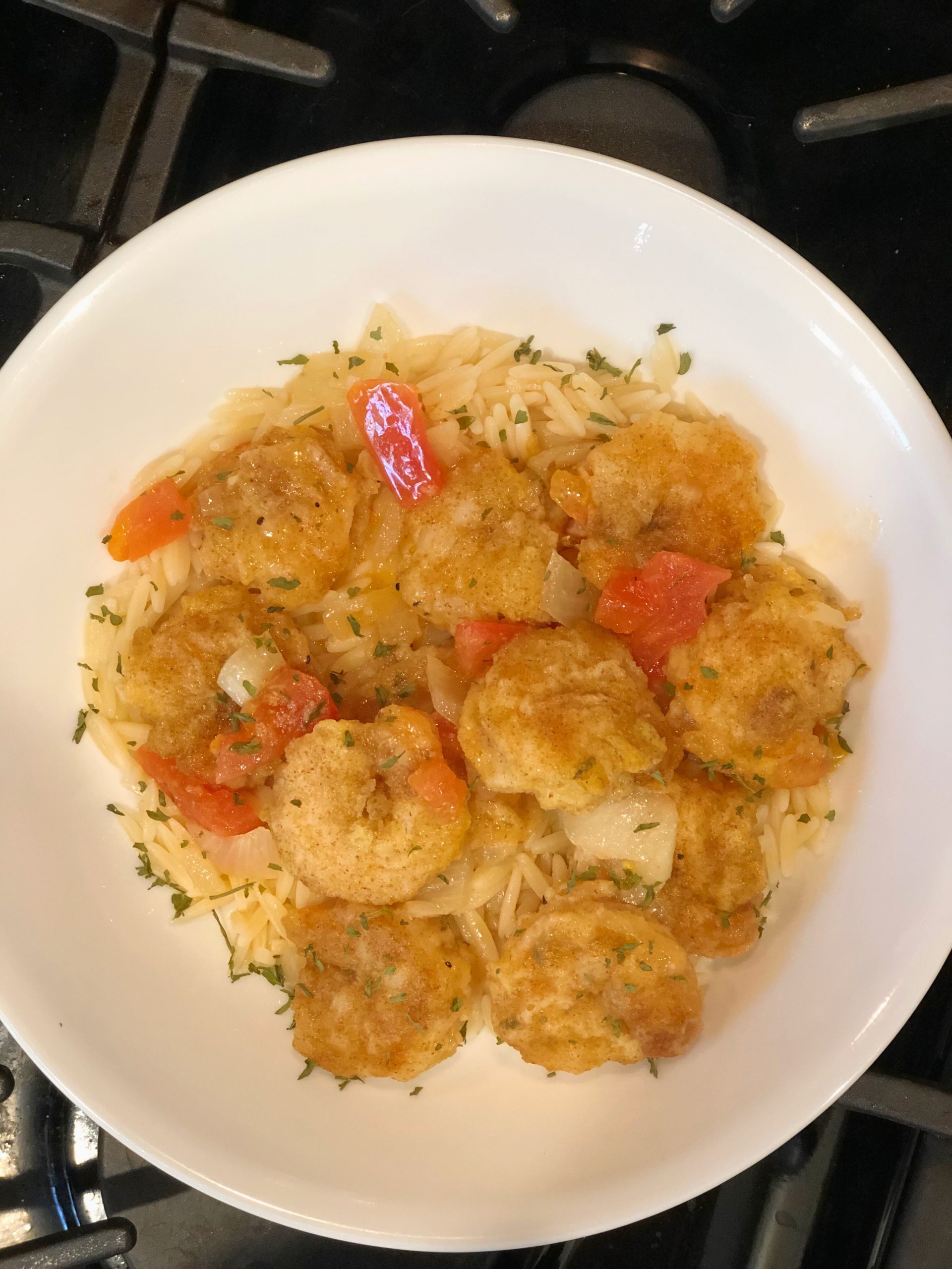 healthy shrimp franchaise on a white plate