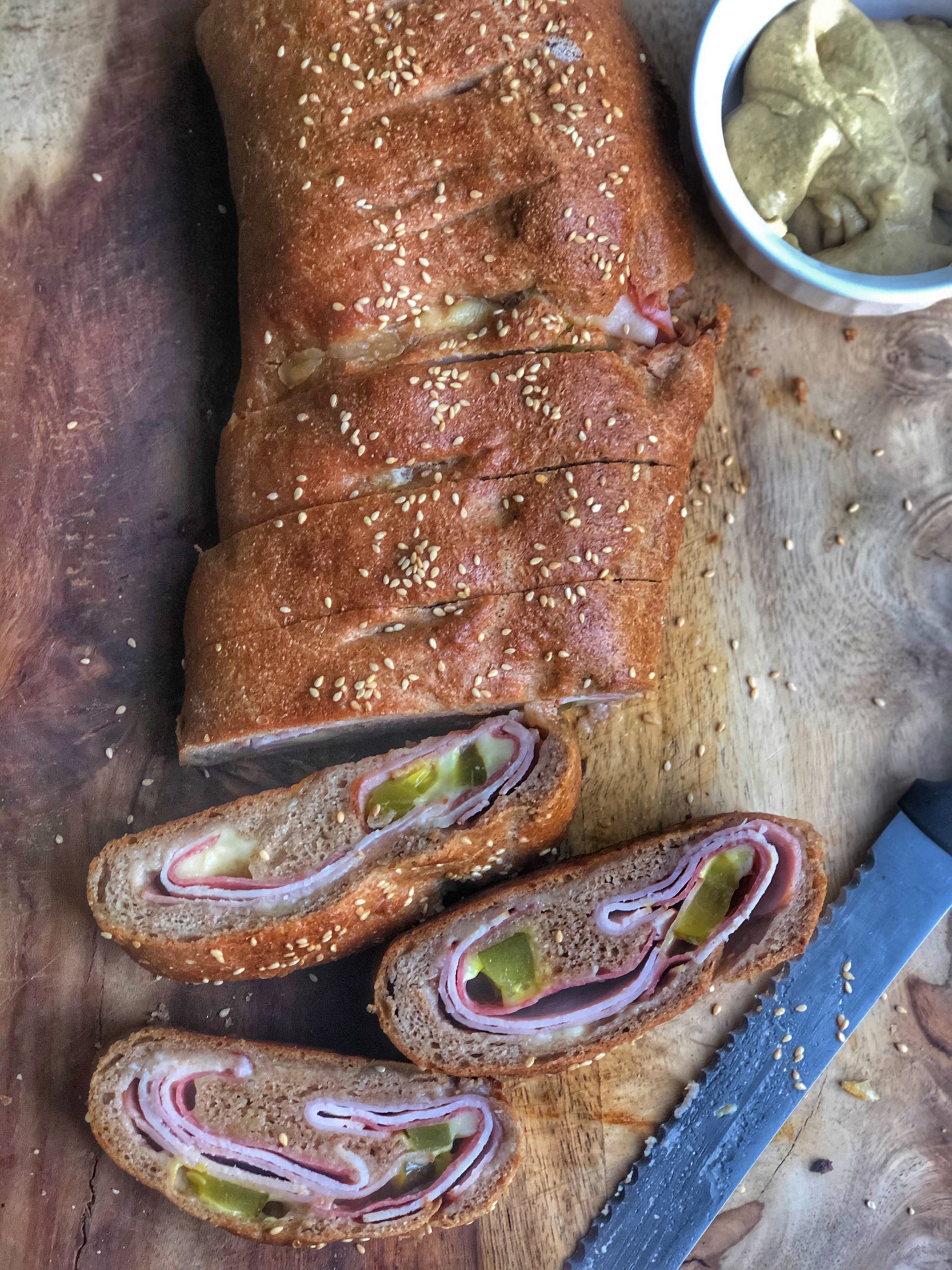 healthy cuban stromboli on a wooden board