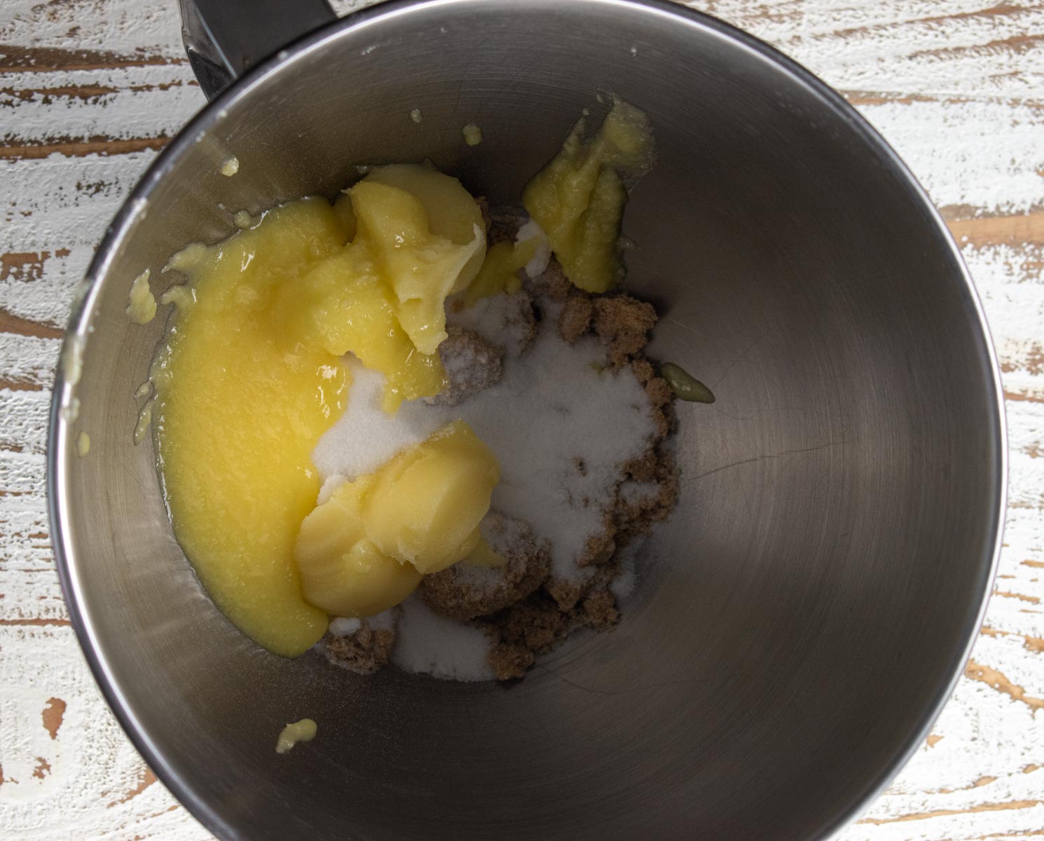 dry ingredients plus ghee in a kitchen aide stand mixer