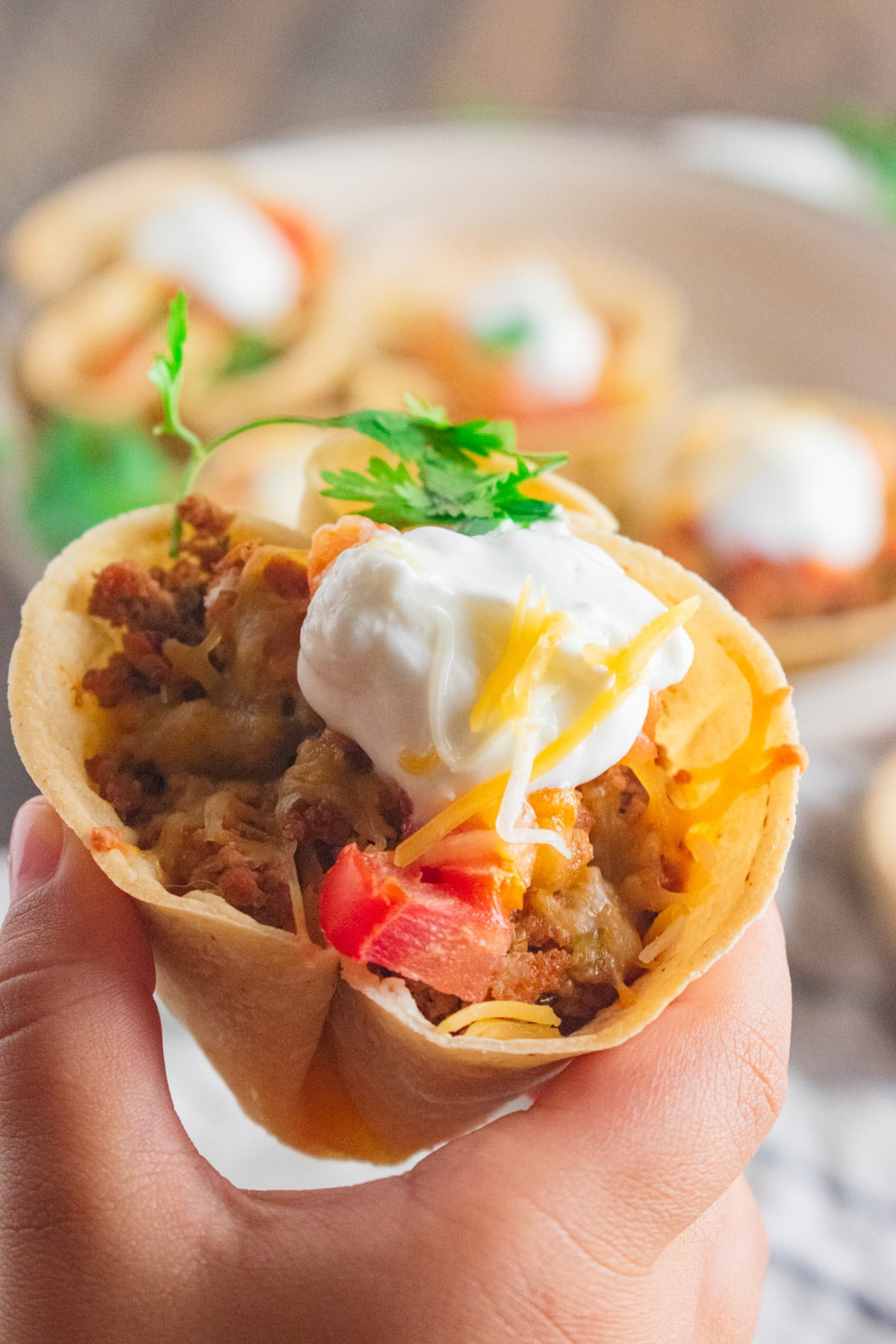 A close up of a taco cupcake made with ground turkey.