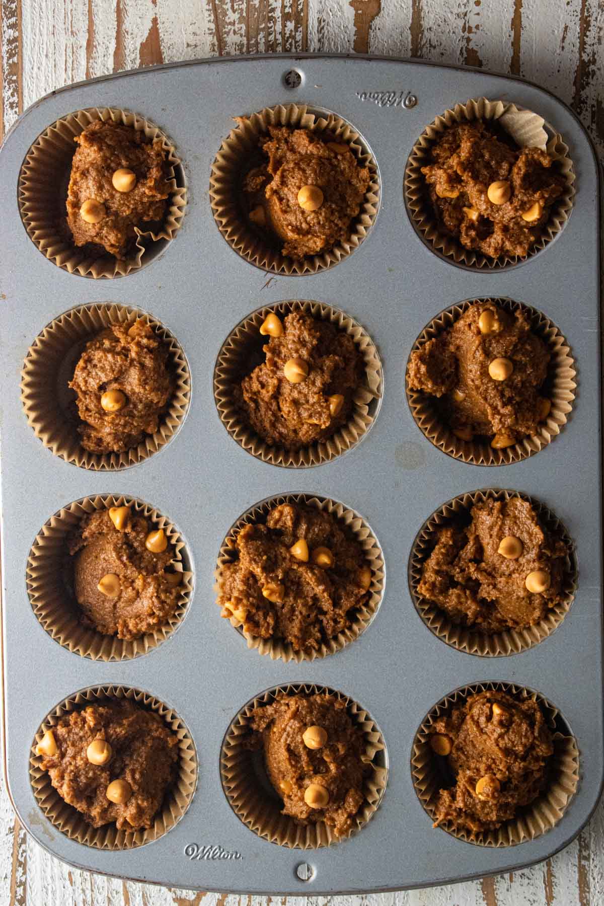 Step 4 - pumpkin muffins in liners in muffin tin right before baking. 