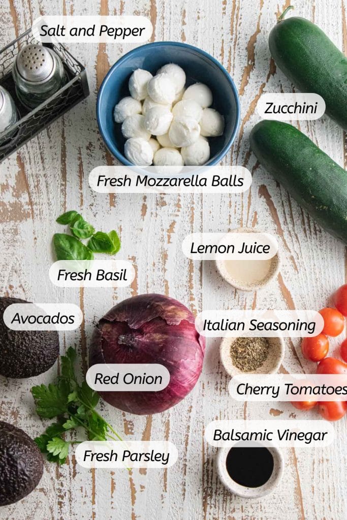 a birds-eye view of all the ingredients needed to make this salad with labels included.