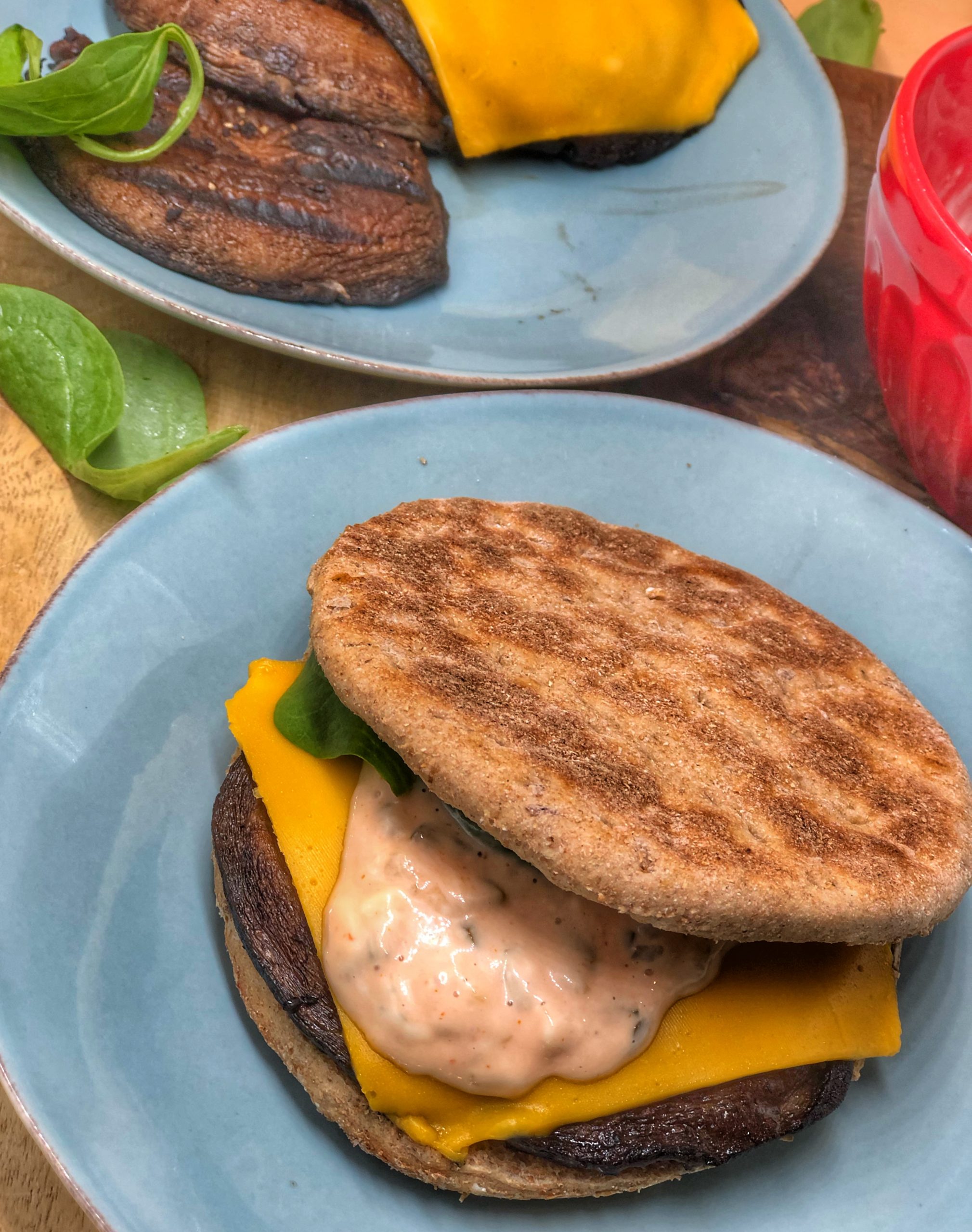 portobello mushroom burgers close up on a blue plate