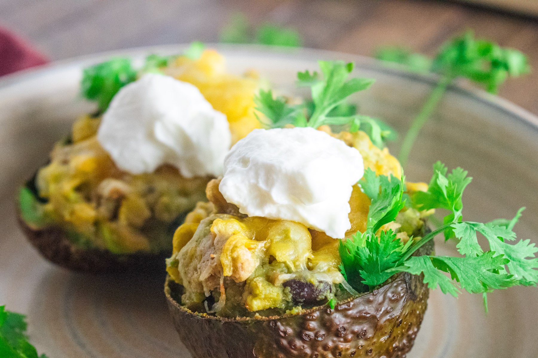 Close up of chicken stuffed avocados