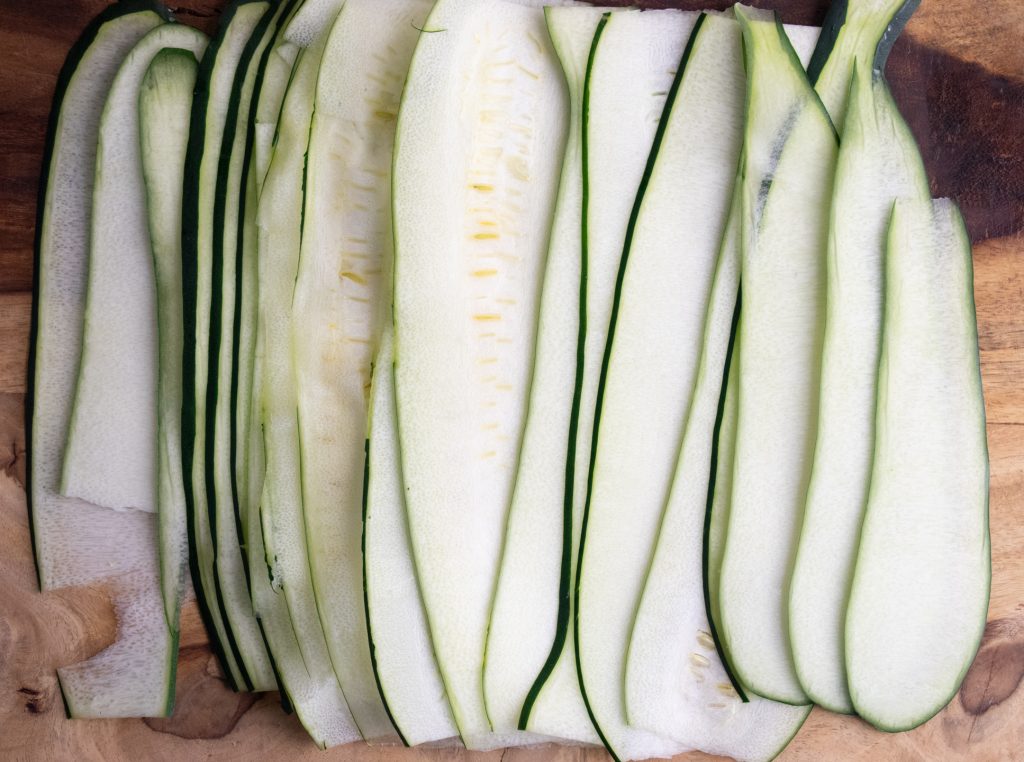 zucchini lined up in strips