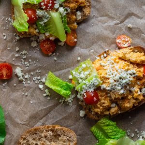 birds eye view of the ultimate buffalo chicken sloppy joes on parchment paper