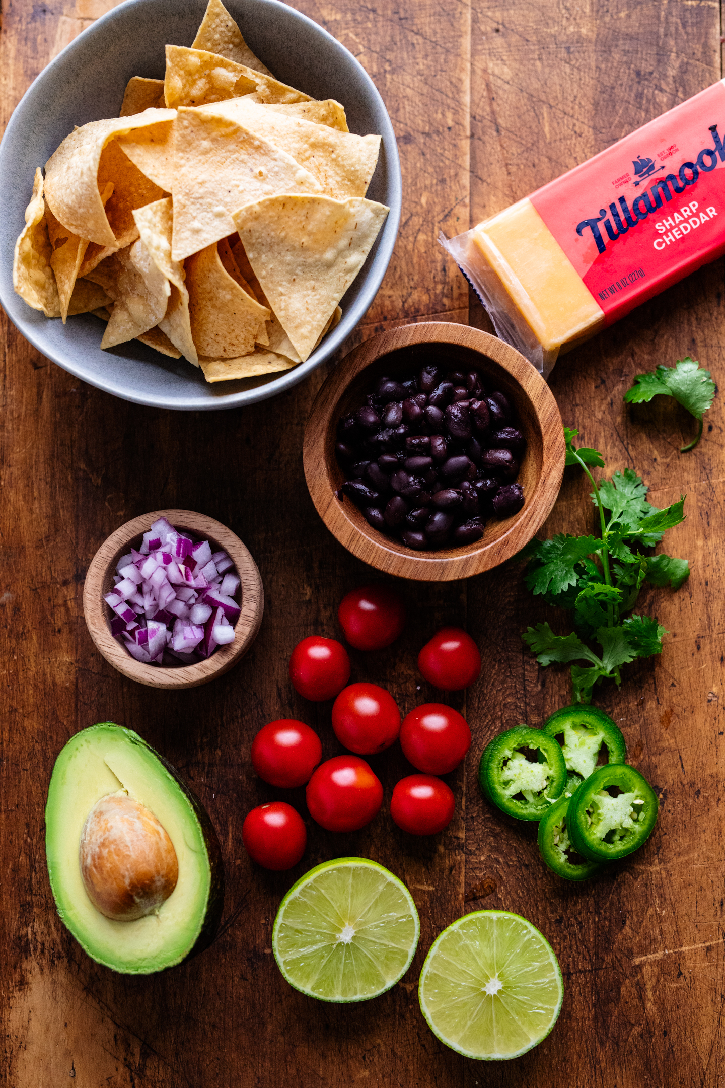 ingredients to make loaded vegetarian sheet pan nachos