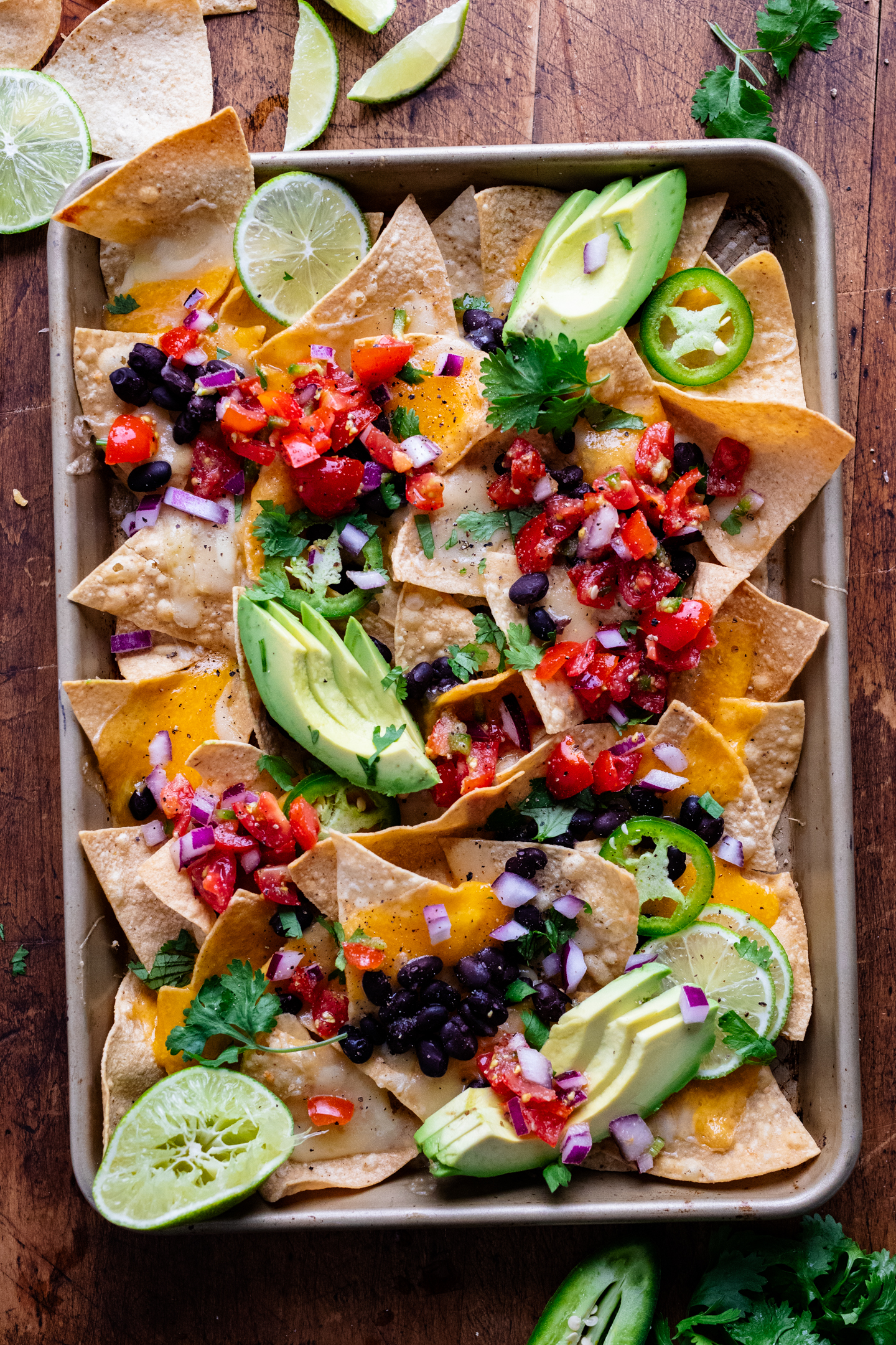 birds eye view of loaded vegetarian sheet pan nachos