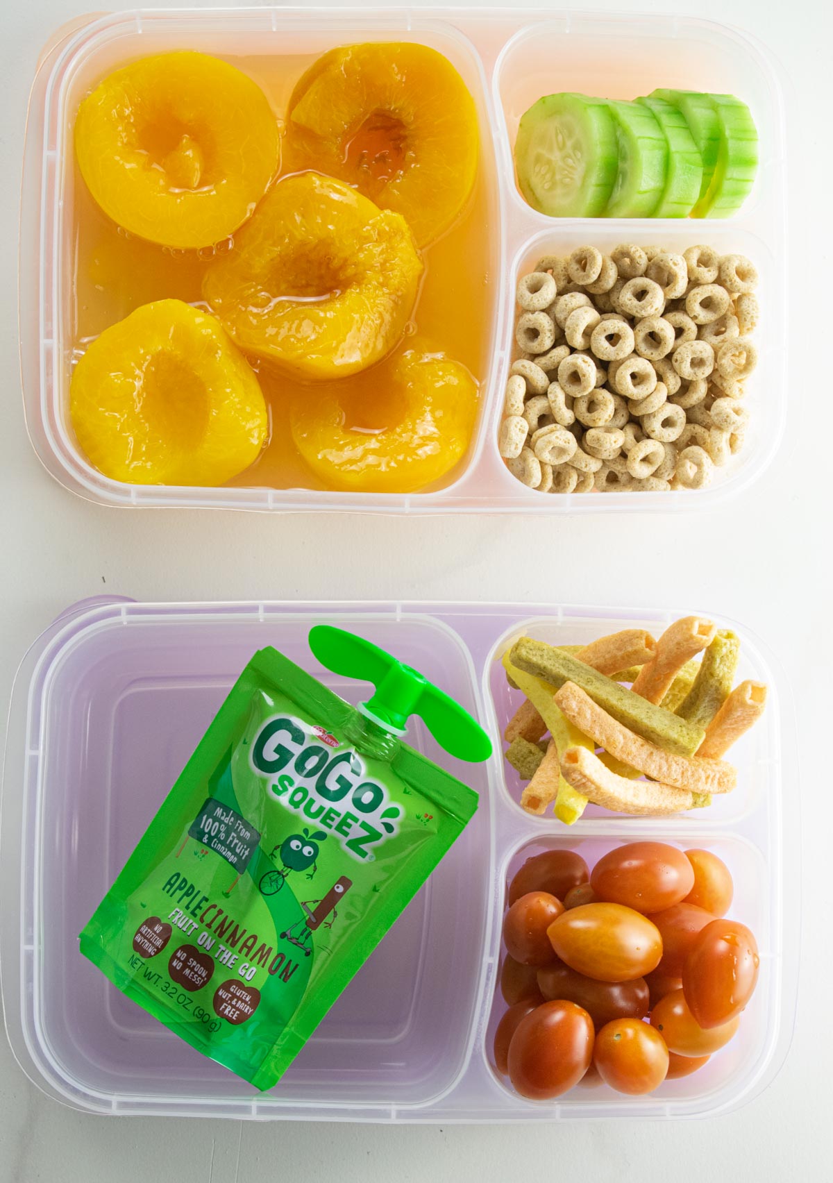 peaches, cucumbers, cheerios, gogo squeeze pouch, grape tomatoes, and veggies straws