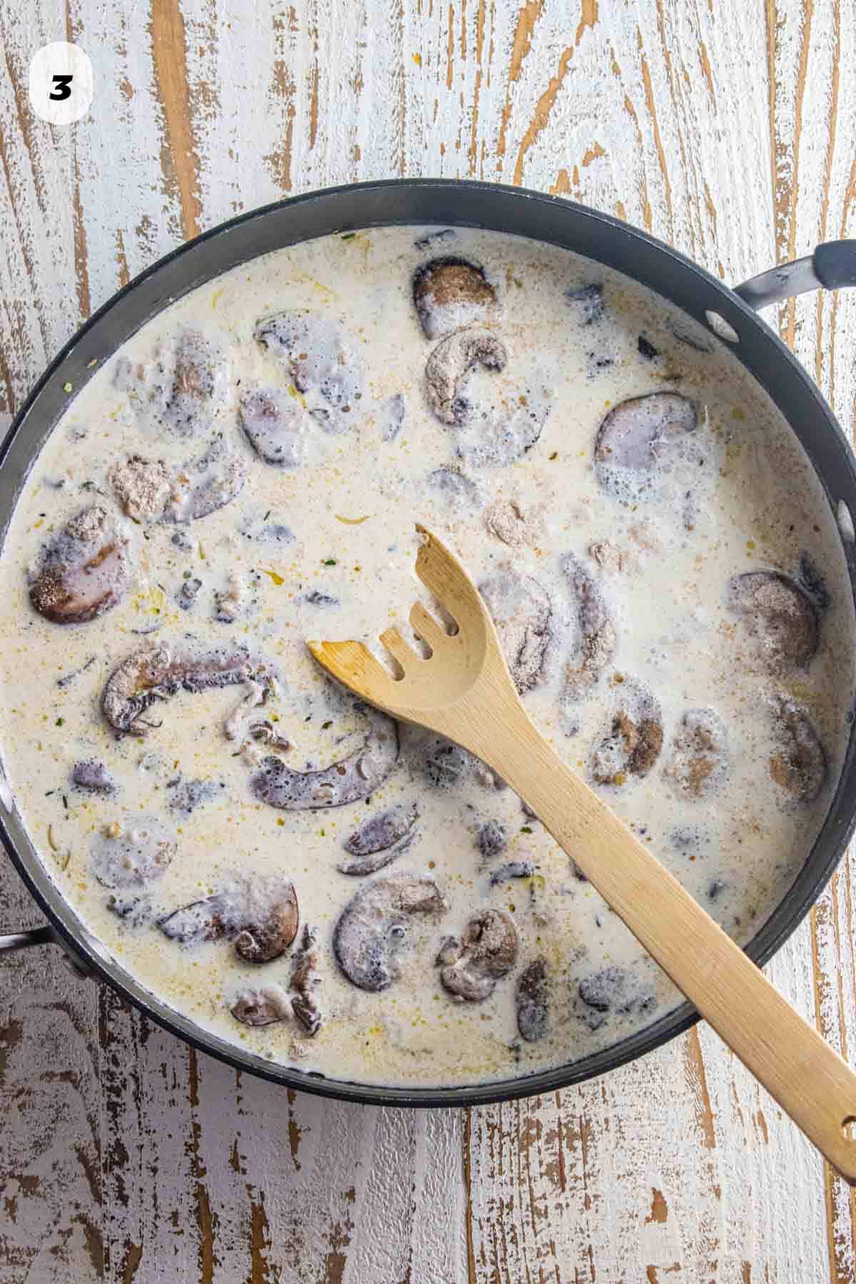 Step 3 - flour, wine, lemon juice, zest, and heavy cream added to the pan.